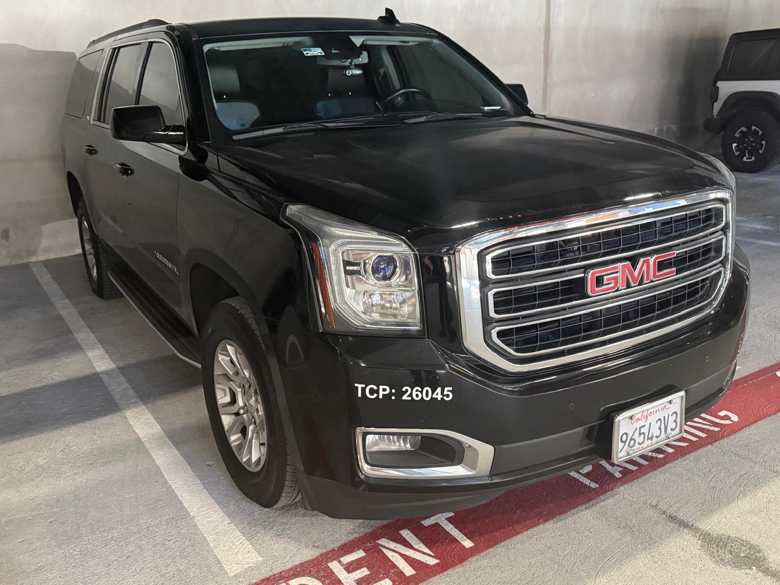 Jet Car Limo's black GMC Yukon XL parked in the garage